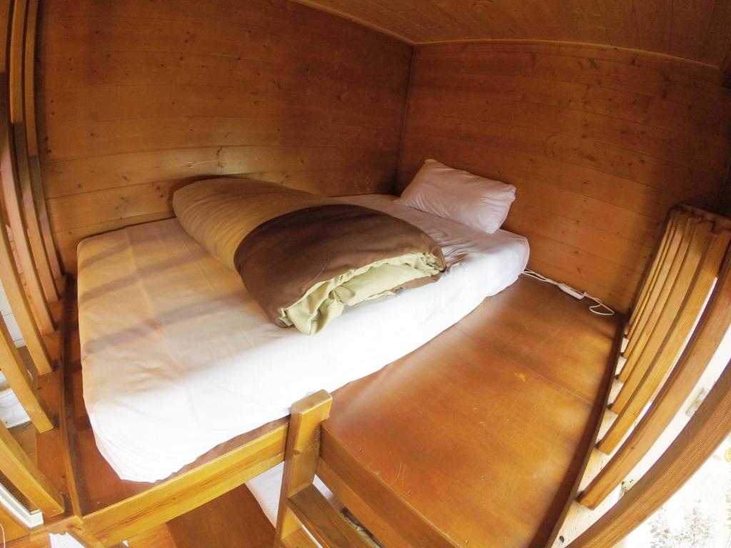 Postel nebo postele na pokoji v ubytování Dingdai Glass Villa