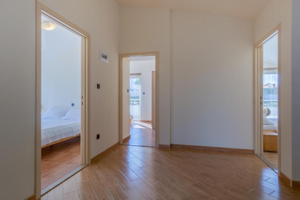 Posteľ alebo postele v izbe v ubytovaní Holiday Home Matela