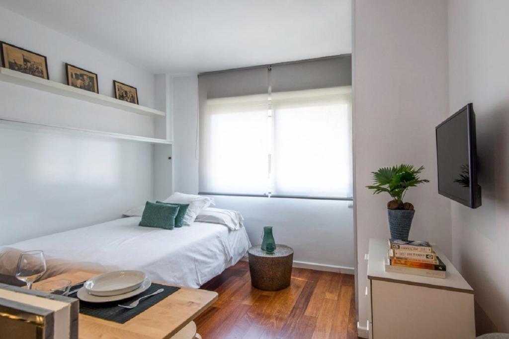 TV a/nebo společenská místnost v ubytování Madrid Rental Flats - Alquiler de Temporada