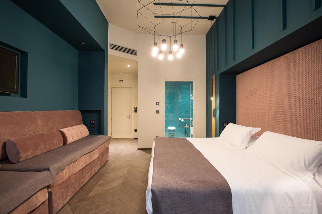 Postel nebo postele na pokoji v ubytování Hotel Silla