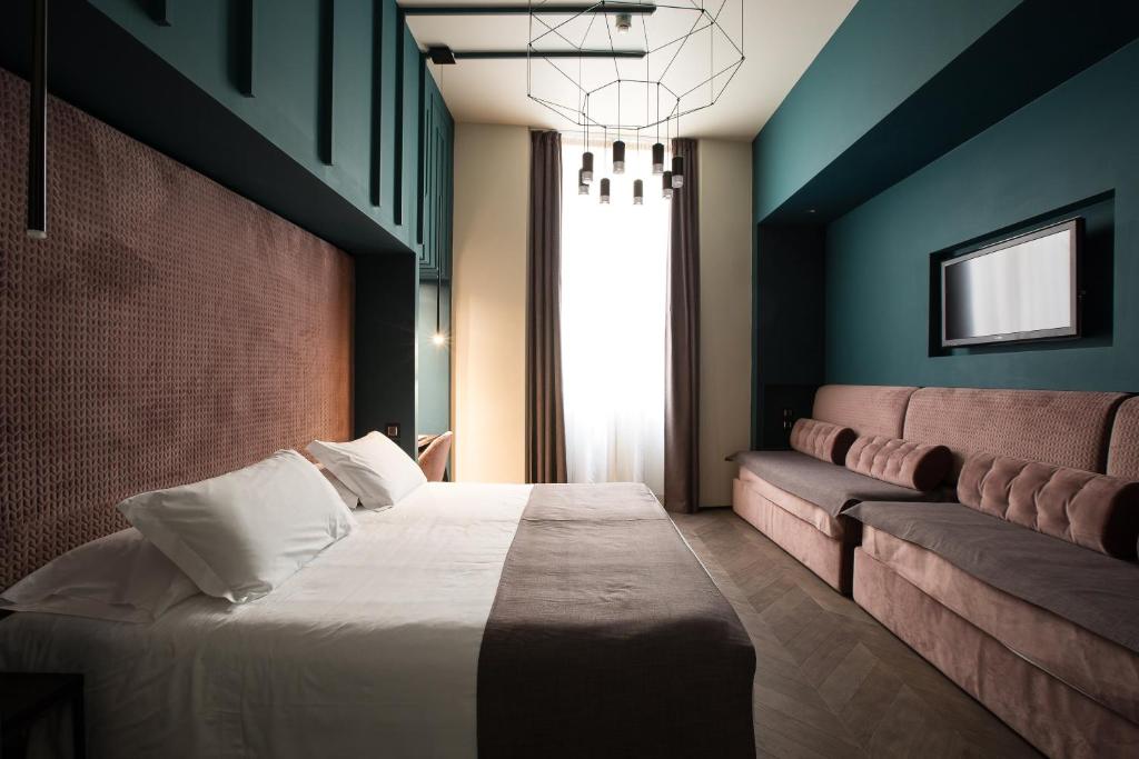 Postel nebo postele na pokoji v ubytování Hotel Silla
