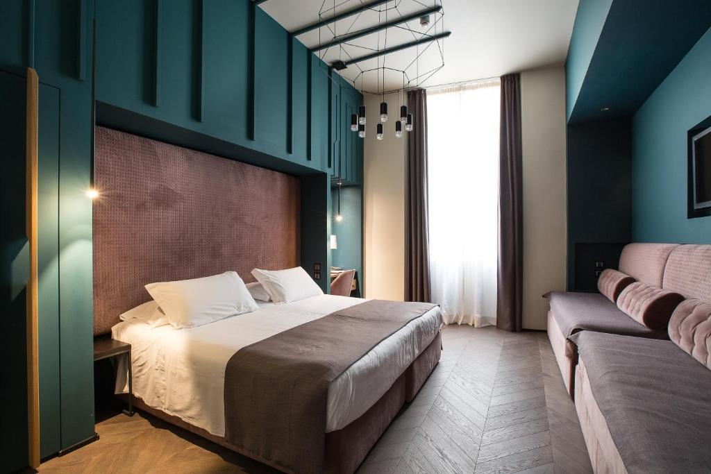 Postel nebo postele na pokoji v ubytování Hotel Silla