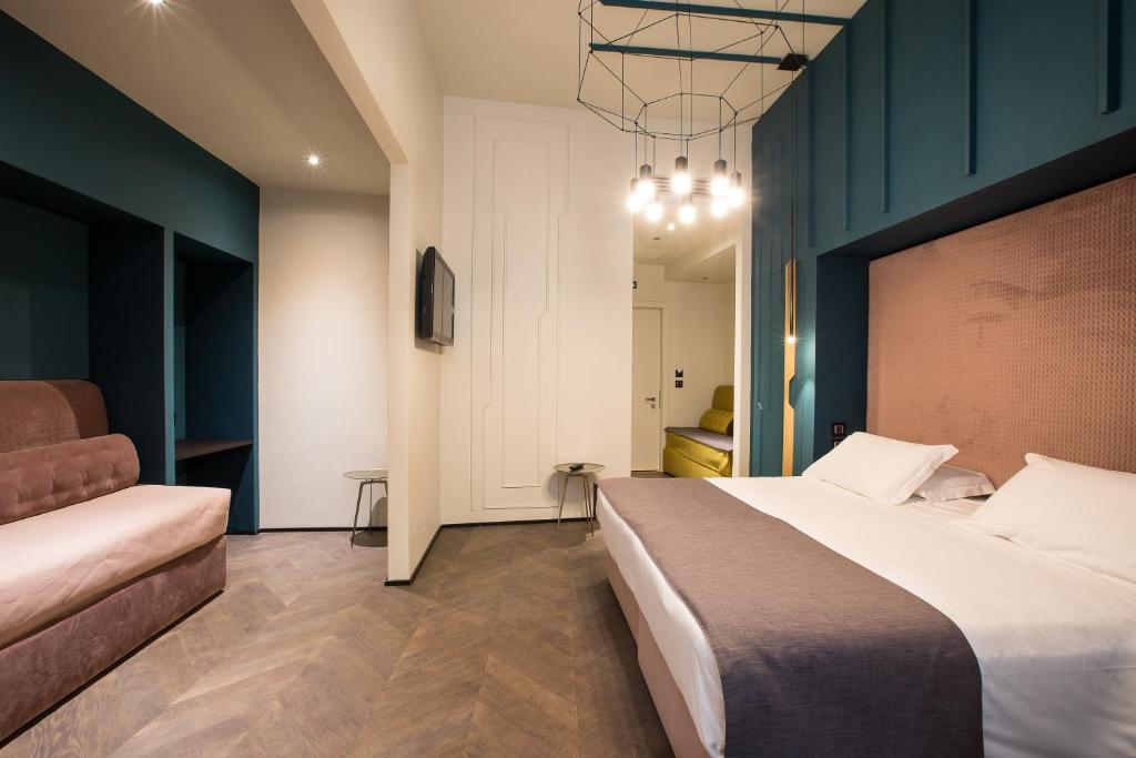 Postel nebo postele na pokoji v ubytování Hotel Silla