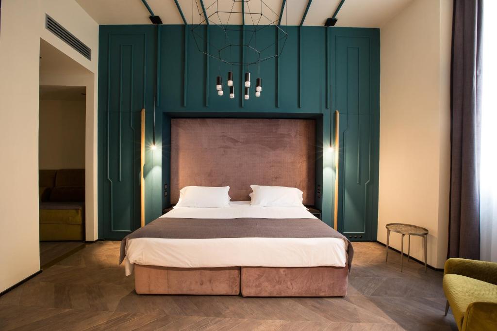Postel nebo postele na pokoji v ubytování Hotel Silla