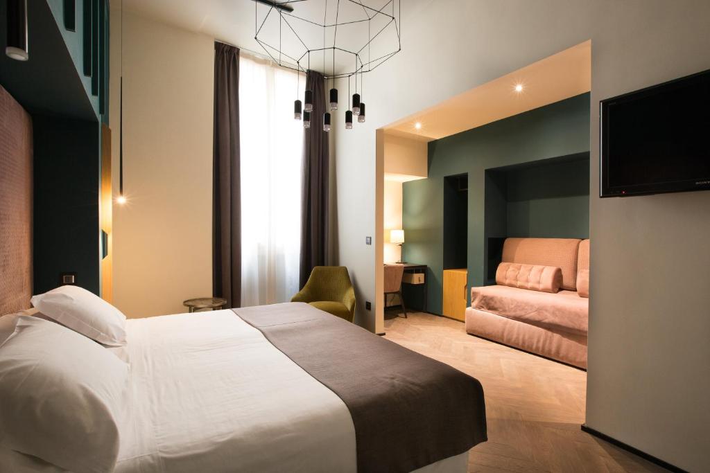 Postel nebo postele na pokoji v ubytování Hotel Silla