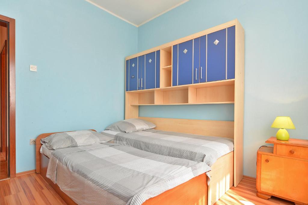 Łóżko lub łóżka w pokoju w obiekcie Apartments Gracijano 1724