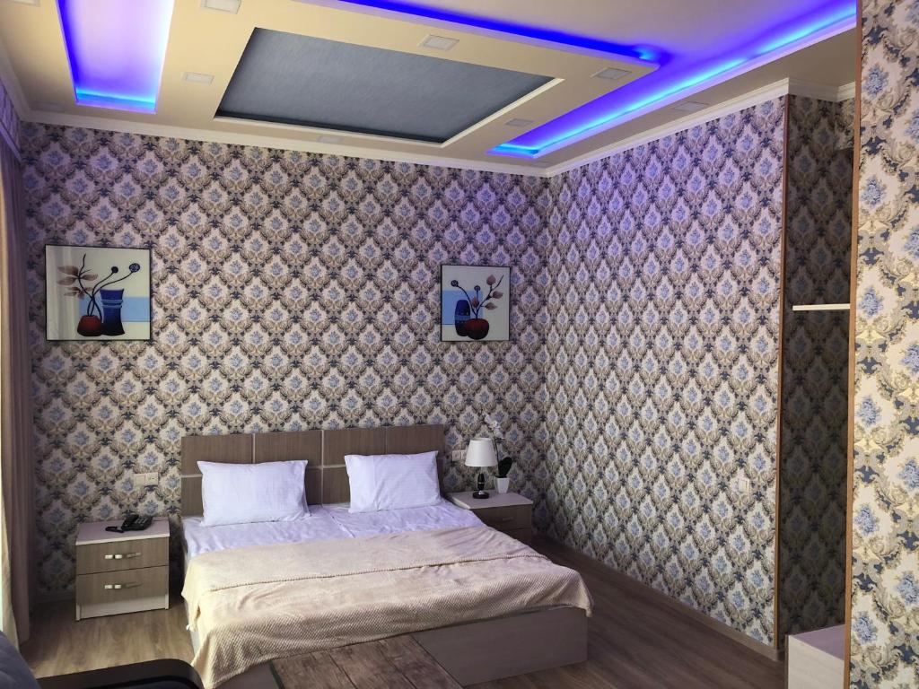 Postel nebo postele na pokoji v ubytování Hotel Felisa Gyumri