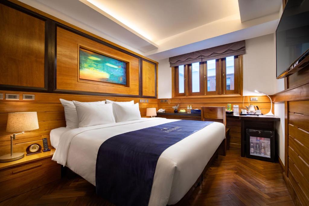 Giường trong phòng chung tại Hai Bay Hotel & Restaurant