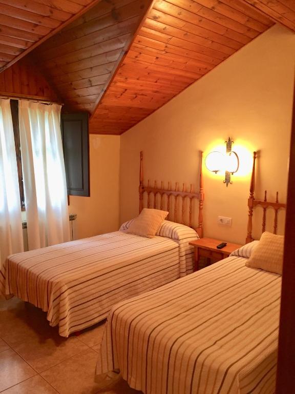 Postel nebo postele na pokoji v ubytování Sol i Neu