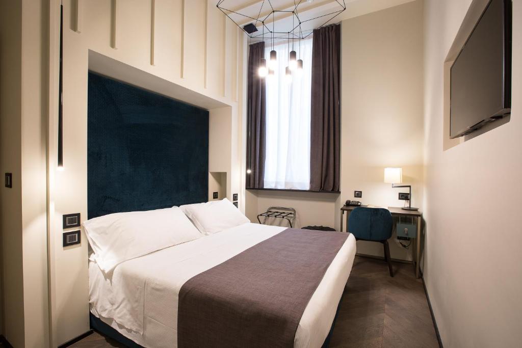 Postel nebo postele na pokoji v ubytování Hotel Silla