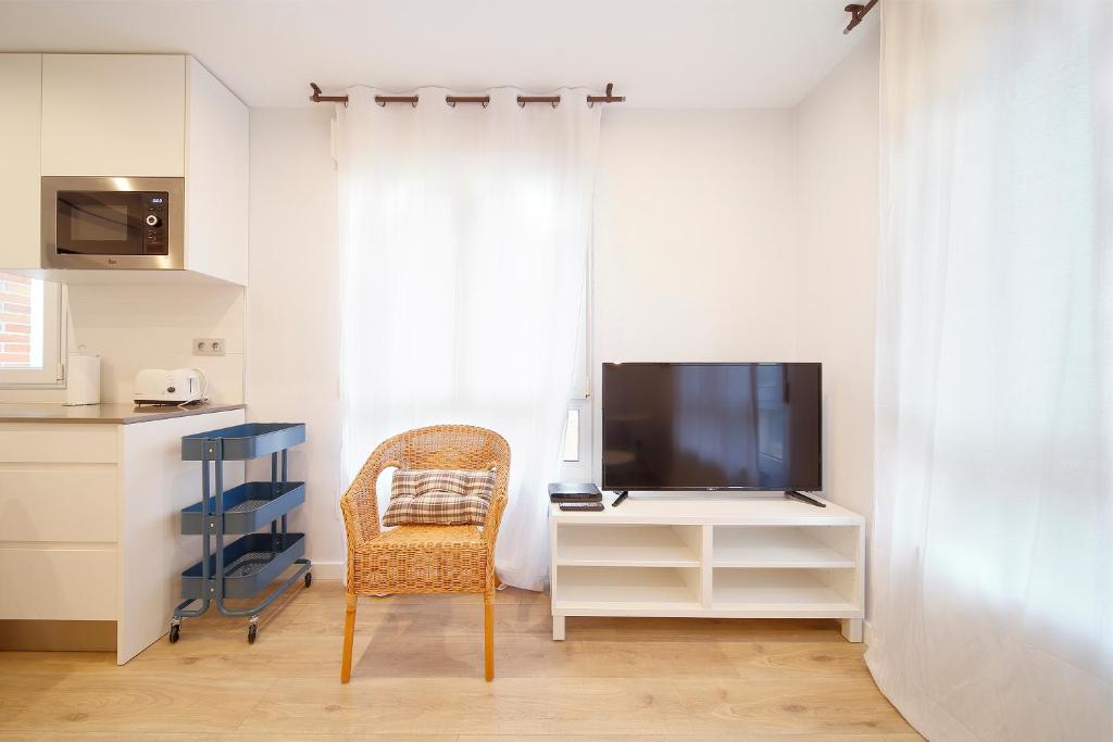 TV a/nebo společenská místnost v ubytování Mirador a Poniente