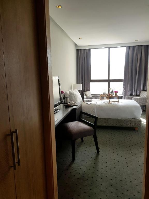 Letto o letti in una camera di ODYSSEE Boutique Hotel Casablanca
