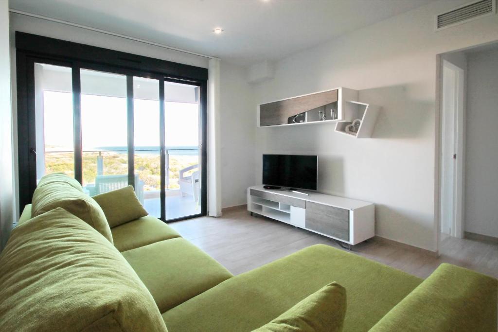 A television and/or entertainment centre at Alex Sun