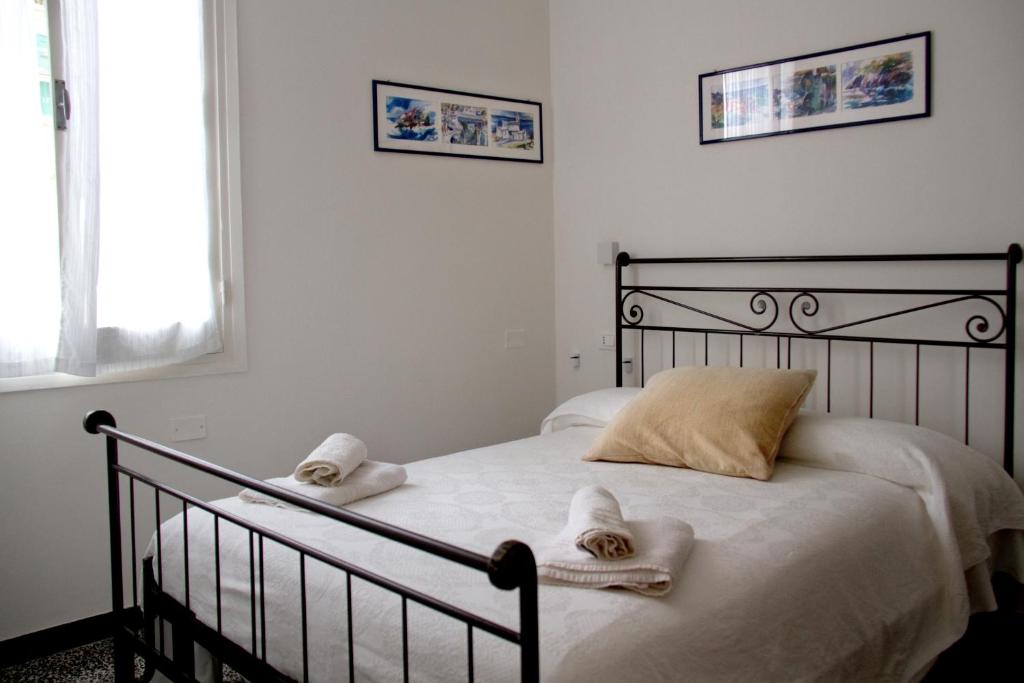 Postel nebo postele na pokoji v ubytování Guesthouse Rollando