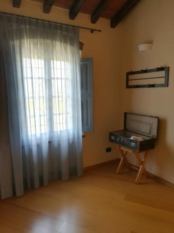 TV a/nebo společenská místnost v ubytování Agriturismo Cascina Farisengo