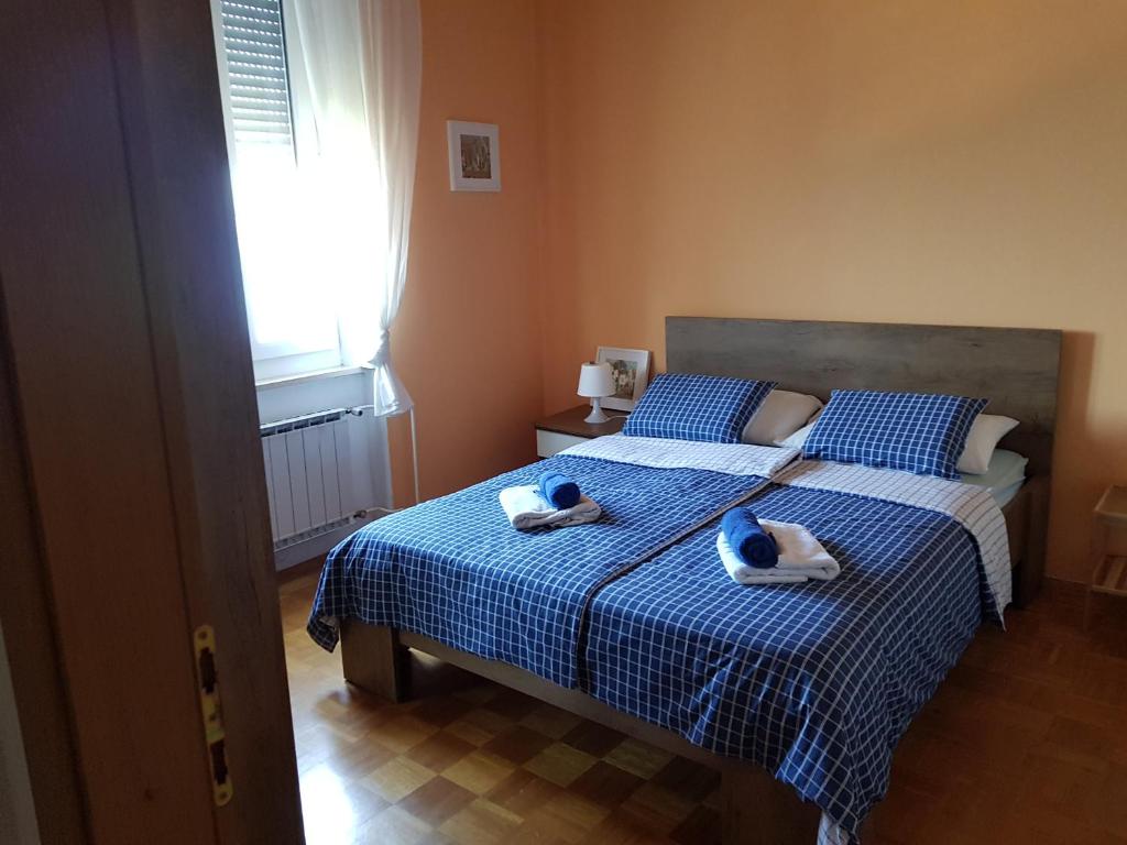 Postel nebo postele na pokoji v ubytování Villa Maria