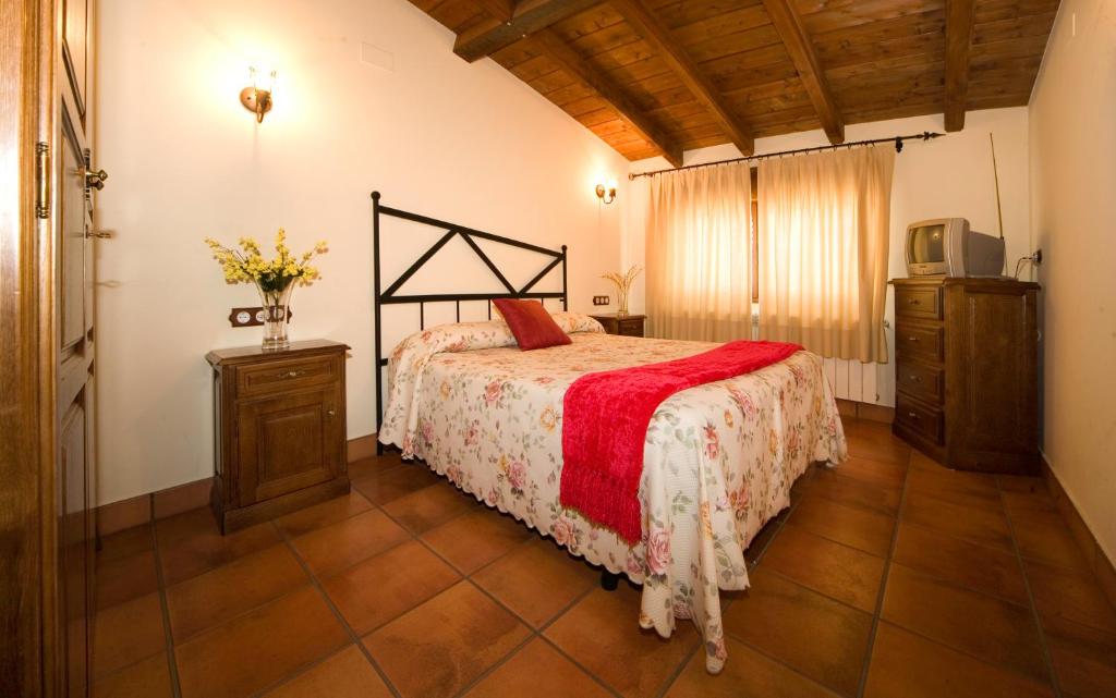 Ein Bett oder Betten in einem Zimmer der Unterkunft La Venta de los Arribes