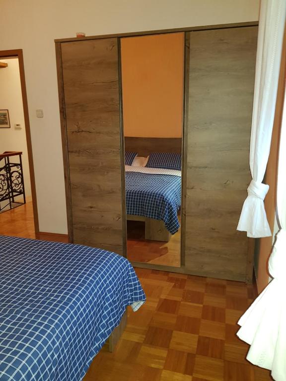 Postel nebo postele na pokoji v ubytování Villa Maria