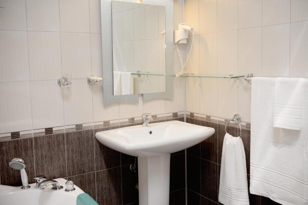 Koupelna v ubytování Family Art-Hotel Zora
