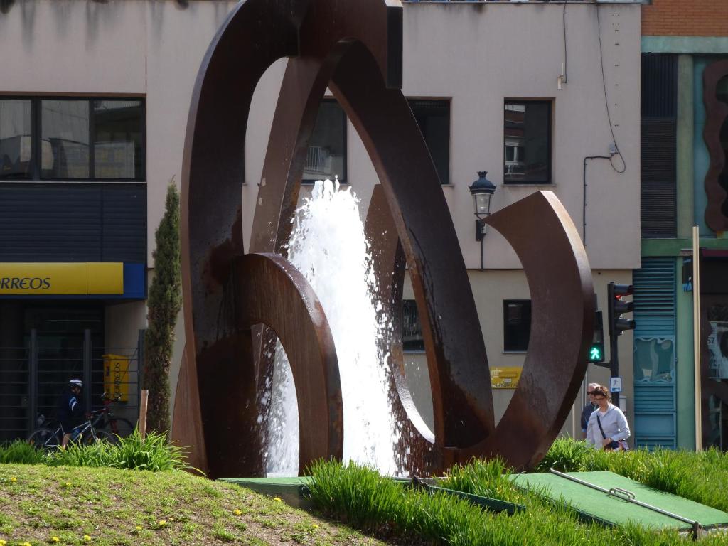 a large water fountain in front of a building at Hotel Costa Brava in Blanes