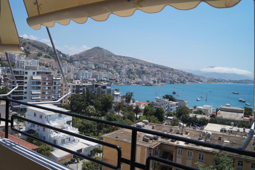 a view of a city from a balcony at Victoria's Sea-Cret in Sarandë