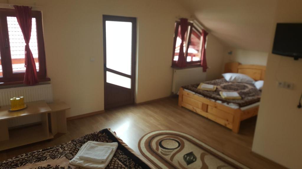 Pensiunea Dealul Frumos - Chambre Quadruple