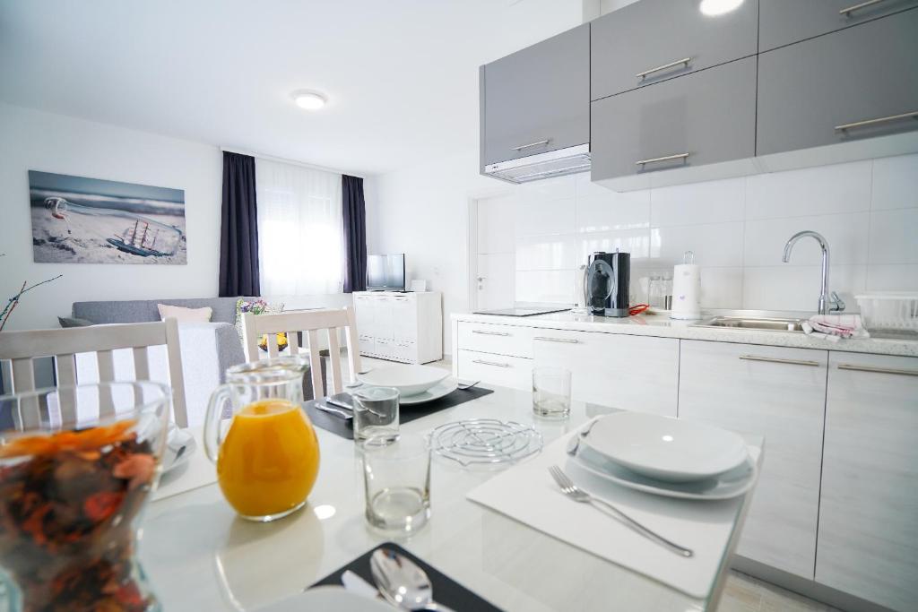 Kuchyň nebo kuchyňský kout v ubytování Apartmani Župan