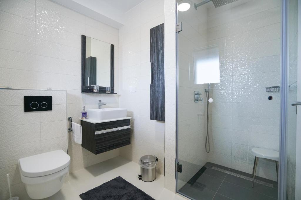 Koupelna v ubytování Apartmani Župan