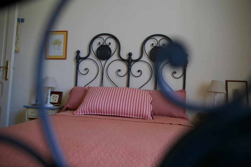 Le Gemme di Pignaにあるベッド