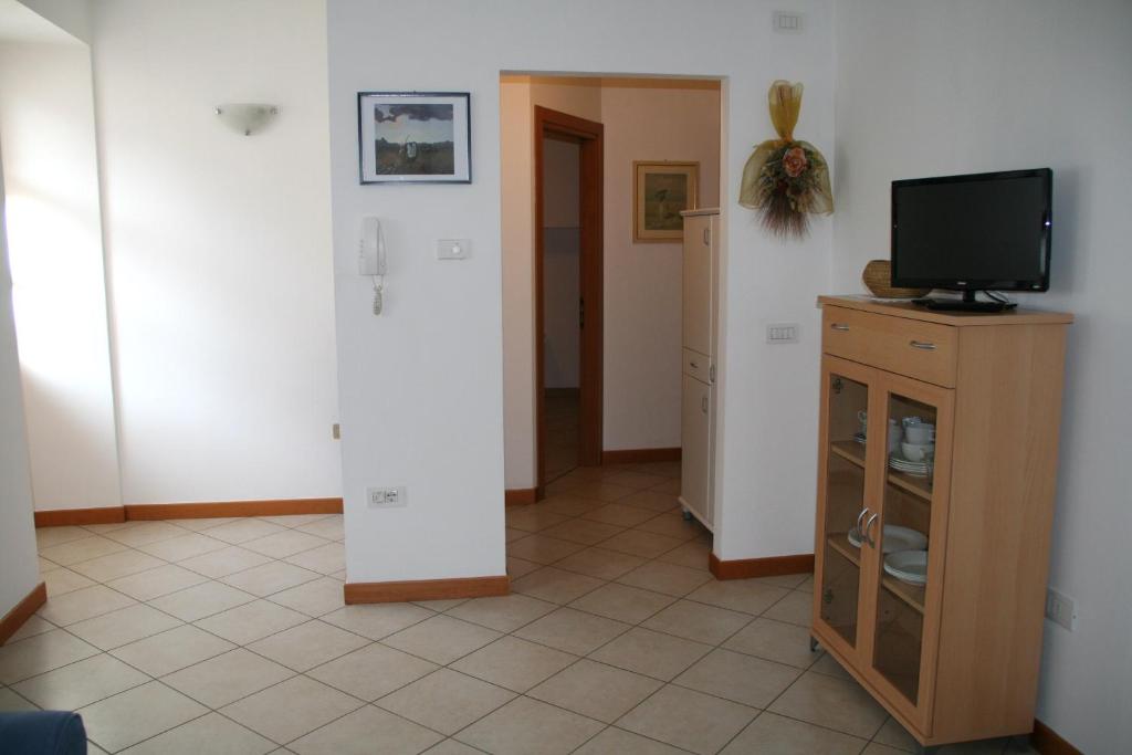 TV a/nebo společenská místnost v ubytování Casa Elisa