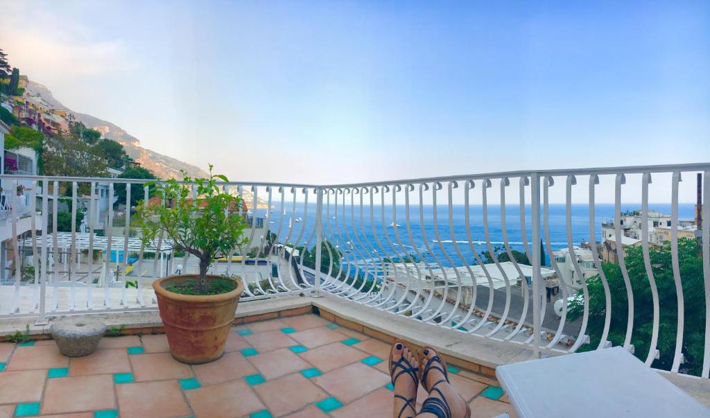 a balcony with a view of the ocean at Hotel Villa Delle Palme in Positano in Positano