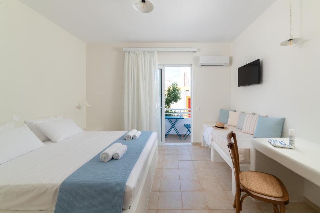 Postel nebo postele na pokoji v ubytování Stegna Akti Luxury Suites