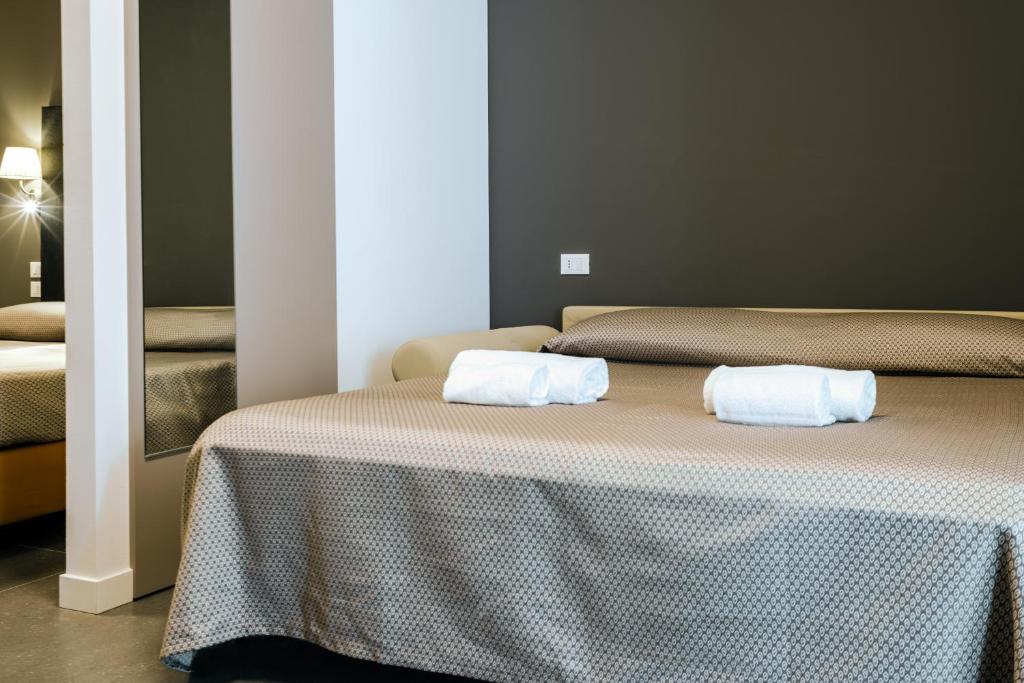 Postel nebo postele na pokoji v ubytování Garda Guest House