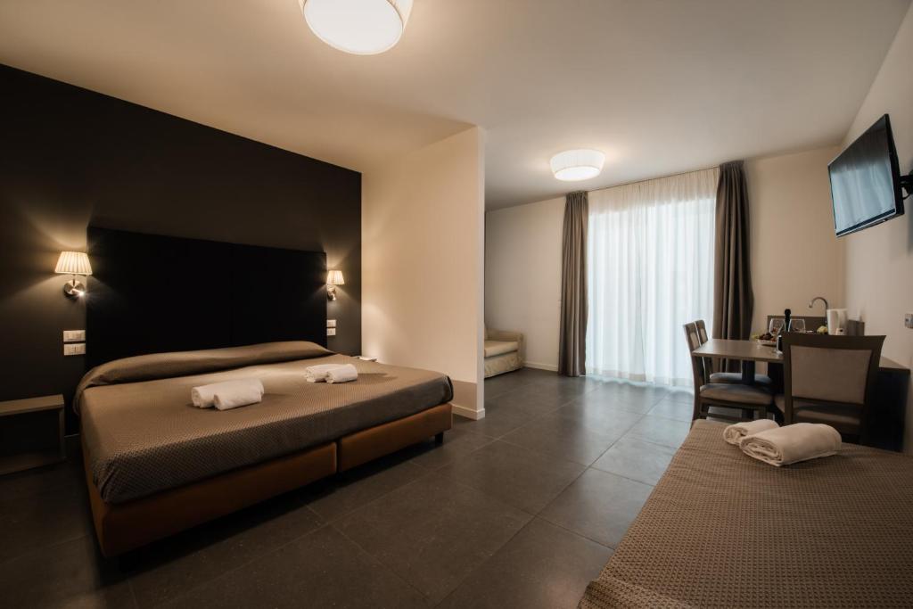 TV a/nebo společenská místnost v ubytování Garda Guest House