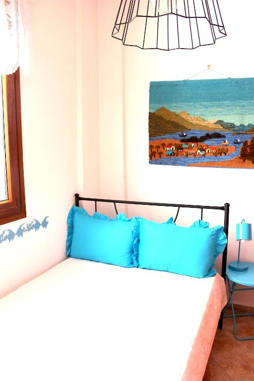 Postel nebo postele na pokoji v ubytování Siviri Apartment in Blu