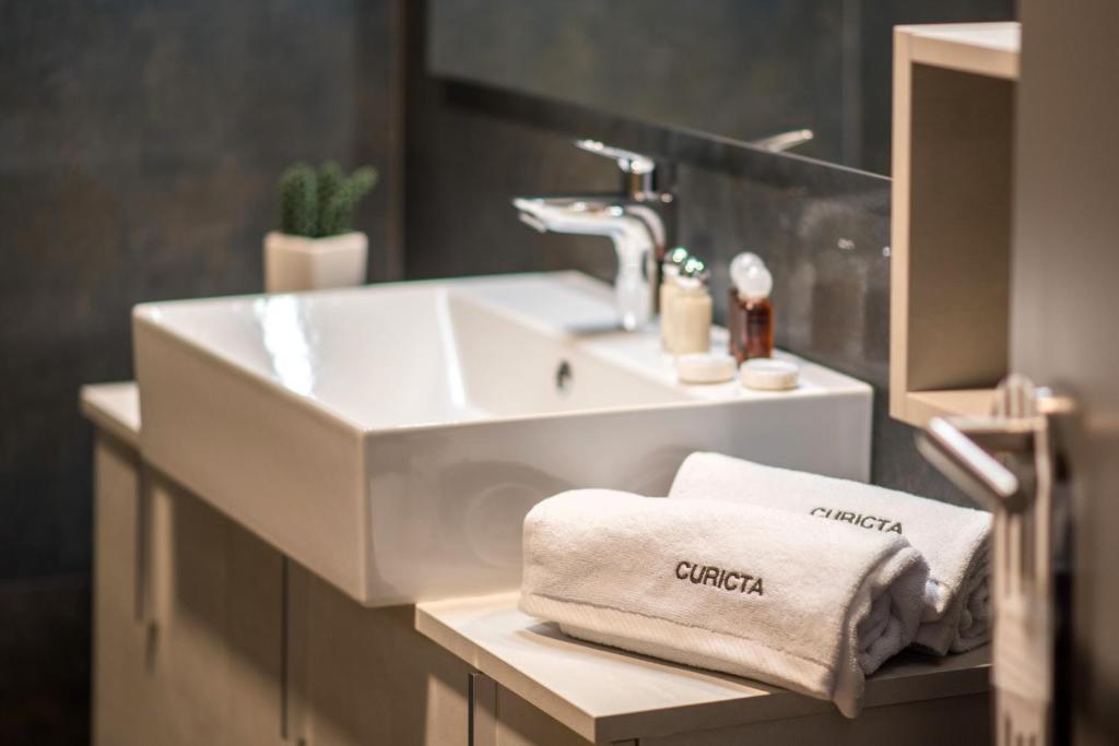Kúpeľňa v ubytovaní CURICTA Design Apartments