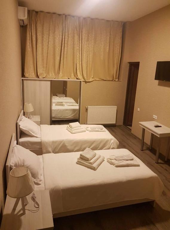 Postel nebo postele na pokoji v ubytování SResidence
