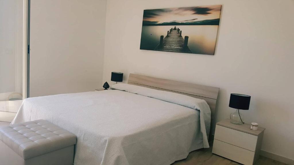 Katil atau katil-katil dalam bilik di Hotel Falco D'oro