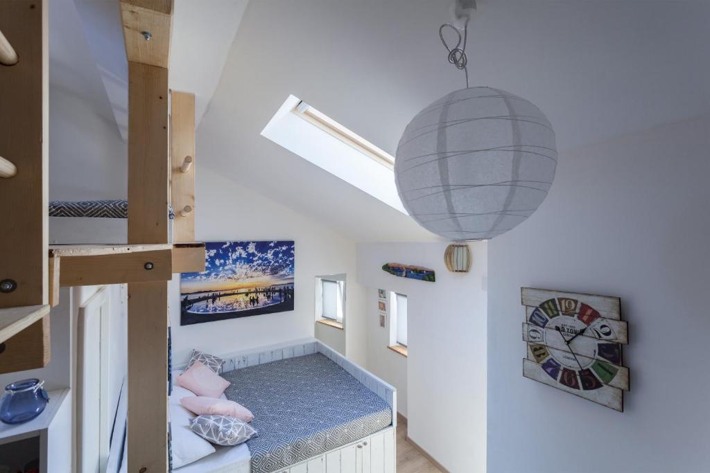 Posteľ alebo postele v izbe v ubytovaní Guest House Blue