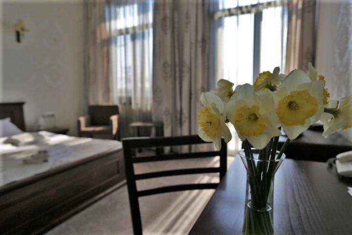Postel nebo postele na pokoji v ubytování Hotel Neptun