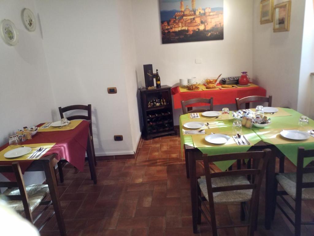 A bed or beds in a room at Il Pozzo Di Sant'Andrea