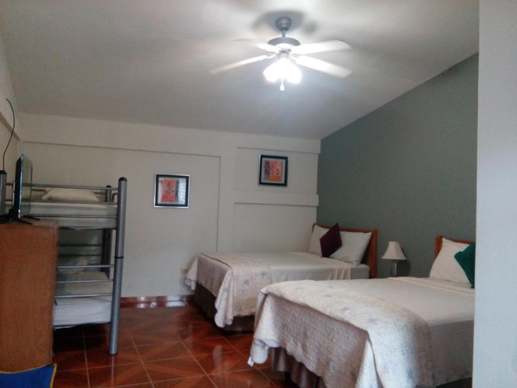 Postel nebo postele na pokoji v ubytování Hotel Vista del Mar