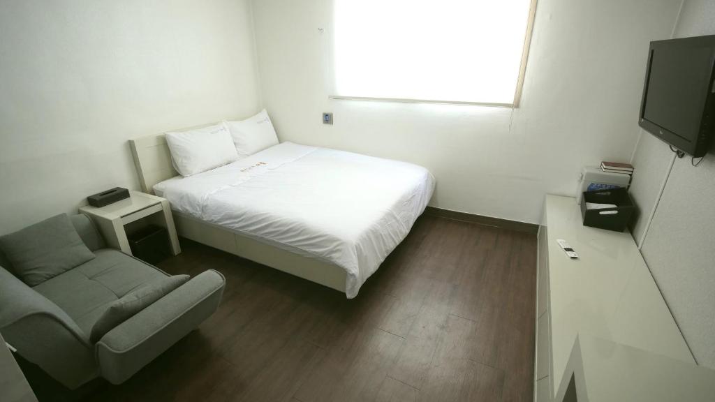 TV a/nebo společenská místnost v ubytování Residence Mumum Hotel