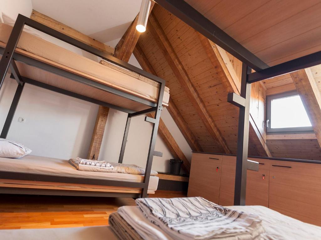 Postel nebo postele na pokoji v ubytování Hostel Situla