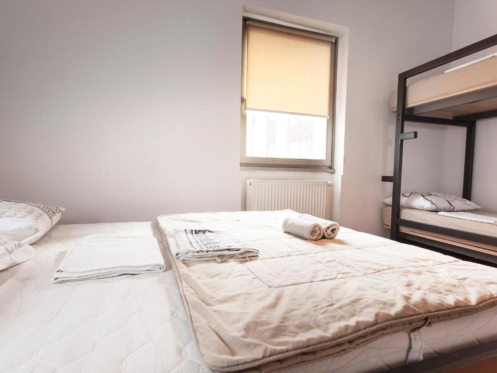 Postel nebo postele na pokoji v ubytování Hostel Situla