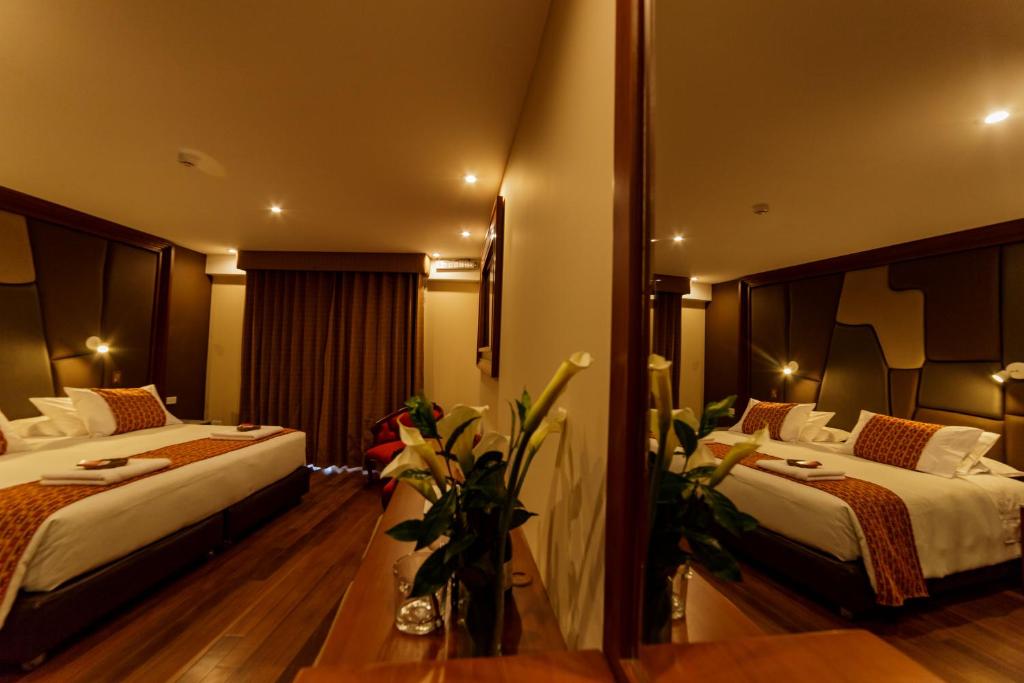 Cama o camas de una habitación en Yawar Inka Hotel