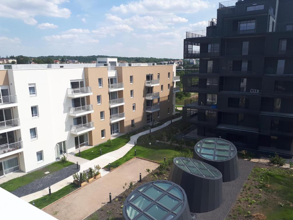 an aerial view of some apartment buildings at Domitys La Calliope in Metz