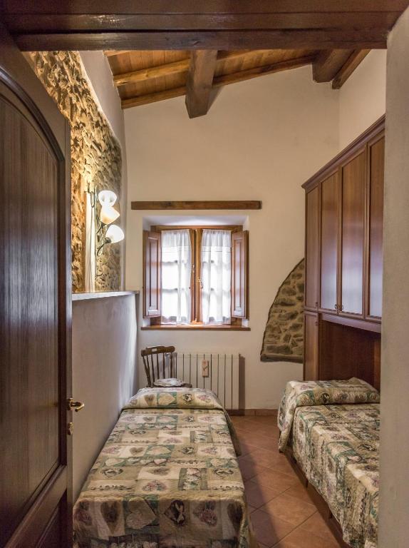 A bed or beds in a room at I 3 Porcellini