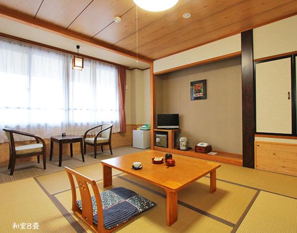 TV a/nebo společenská místnost v ubytování Nezame Hotel