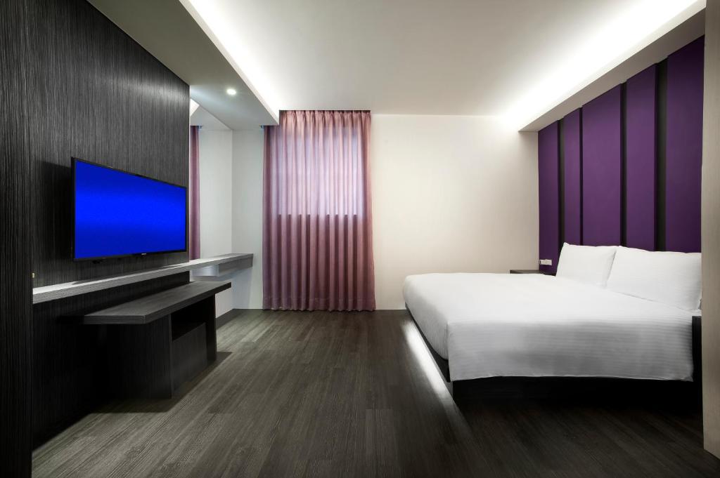 TV a/nebo společenská místnost v ubytování Two Fukun Hotel